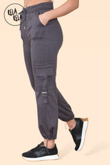 Side angle showing pocket details on ladies charcoal tapered cargo pants
