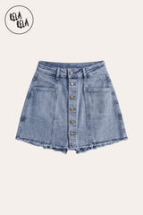 Flat lay of the Blue multi-button stretchy denim skorts against a white background, showcasing the premium denim texture, built-in shorts, and signature utilitarian details.