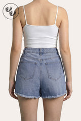 Rear view of the Rela Rela Blue stretchy skorts, featuring the clean-cut back pockets and the gap-free waistband fit of the premium denim.