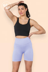 Model wearing high waisted lilac scrunch bum shorts