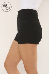 Side view of black denim shorts for women in high waisted fit