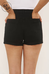 Back view of stretchy black denim shorts for women