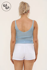 Back view of white denim shorts with stretch for women
