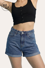 Model wearing RELA RELA Tiered Ruffle Denim Mini Skirt in Light Blue, Y2K High-Waisted Fit.
