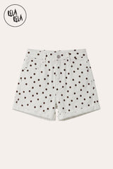 Flat lay of the Rela Rela White Polka Dot high-waisted denim shorts with tailored turn-up cuffs, showcasing the dotted fabric and summer-ready finish.