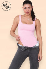 Model styling pink square neck bodysuit with jeans for casual look