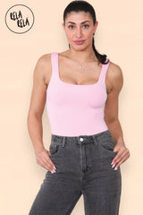 Model wearing pink sculpting bodysuit front view