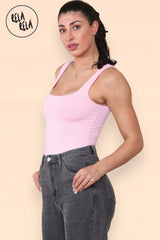 Side profile showing double layer seamless bodysuit fit in pink