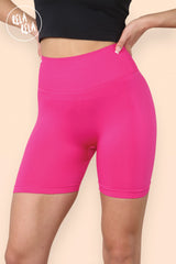 Detail shot of scrunch bum seam on hot pink women's cycling shorts