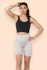 Model wearing high waisted stone grey scrunch bum shorts