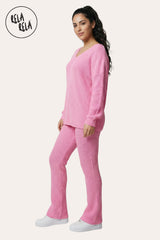 Front View of Longline V-Neck Knitted Jumper & Flared Trousers Lounge Set in Pink
