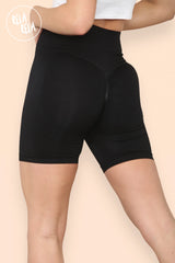 Back view showcasing ruched scrunch bum design on black gym shorts