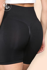 back view showcasing ruched scrunch bum design on black cycling shorts