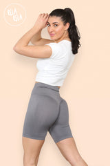 Side angle of charcoal high waisted cycling gym shorts with snug fit