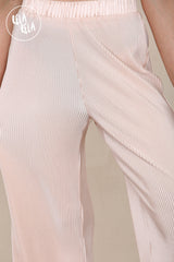 High Waisted Crinkle Plisse Flared Trousers in Peach