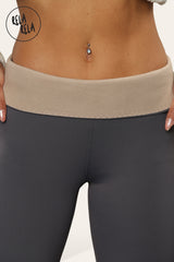 Close-up of waistband on charcoal thermal leggings with sculpt shaping