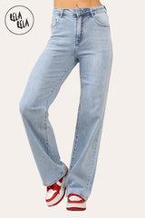 Woman wearing light blue wide leg jeans with sparkle rhinestone details – front view, casual pose.