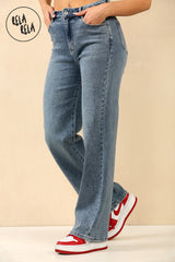Side view of women's denim blue stretchy rhinestone jeans with relaxed wide leg cut.