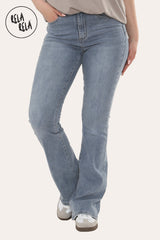 Front view of women's flared stretchy jeans in vintage blue, high waist pull-on style