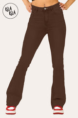 Model wearing Flared Stretchy Pull On Jeans in Chocolate