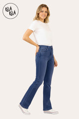 Side view of women's indigo blue flared stretchy jeans highlighting the soft flare and sculpting fit.