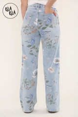 Back view of women’s jeans with flowers in a playful pattern