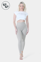 Front view of bleach grey high waisted leggings on model standing upright
