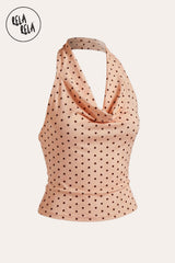 A Ghost Mannequin (Invisible Mannequin) product shot of Rela Rela’s Draped Blush Pink Mesh Halter Top in a three-dimensional, hollow form, showcasing the elegant cowl neck drape and monochrome polka dot print.