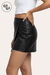 Close-up of side detail on black faux leather wrap front  skorts