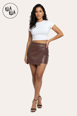 model wear in a styled outfit featuring chocolate asymmetric faux leather skorts