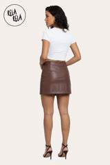 Back view of chocolate faux leather skorts showing smooth PU leather finish