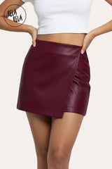 Front view of burgundy faux leather wrap front skorts with asymmetric design