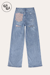 Flat lay of the Blue stretchy rhinestone pocket jeans, showcasing the sparkling diamante details on the back pockets and premium distressed denim texture.