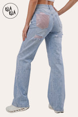 Rear view of the Light Blue jeans showcasing the signature Diamante crystal back pockets and the body-sculpting stretch effect on the waist and hips.