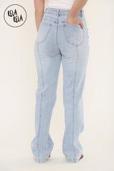 Back view of light blue seamed jeans with flattering high waist fit
