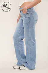 Side view of stretchy straight leg jeans with soft fit and flattering high rise in mid blue