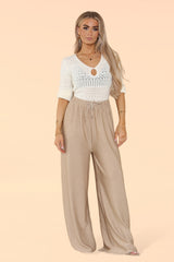 Model in Wide Leg Elasticated Waistband Trousers in Sand Colour