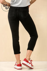 Black 3/4 length cropped denim jeans womens back shot with sleek fit and rear pockets