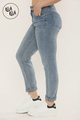 Side view of Ankle Length Stretchy Slim Fit Cropped Jeans in Mid Blue Wash