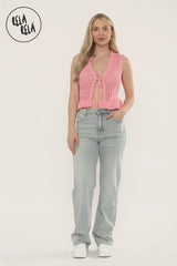 Model wearing high waisted soft stretchy jeans in light blue wash