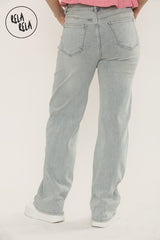 Back view of high waisted stretchy jeans for women in light blue wash