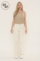 Model wearing high waisted soft stretchy straight leg jeans in Cream
