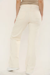 Back view of high waisted stretchy jeans for women in cream