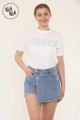 Model wearing blue mid-rise skorts in asymmetric wrap front design