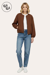 Model wearing oversized chocolate zip-up bomber jacket, pair with jeans