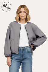 Front view of oversized grey zip-up bomber jacket for women