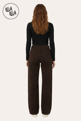 Back view of brown leopard print stretchy wide leg jeans for women