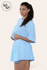 Side view of baby blue crochet top and shorts co ord set for women