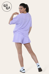 Back view of lilac crochet co ord set featuring loose top and fitted shorts