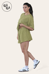 Side view of olive green crochet top and shorts co ord set for women